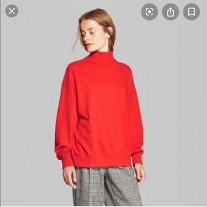 Red oversized turtleneck sweatshirt